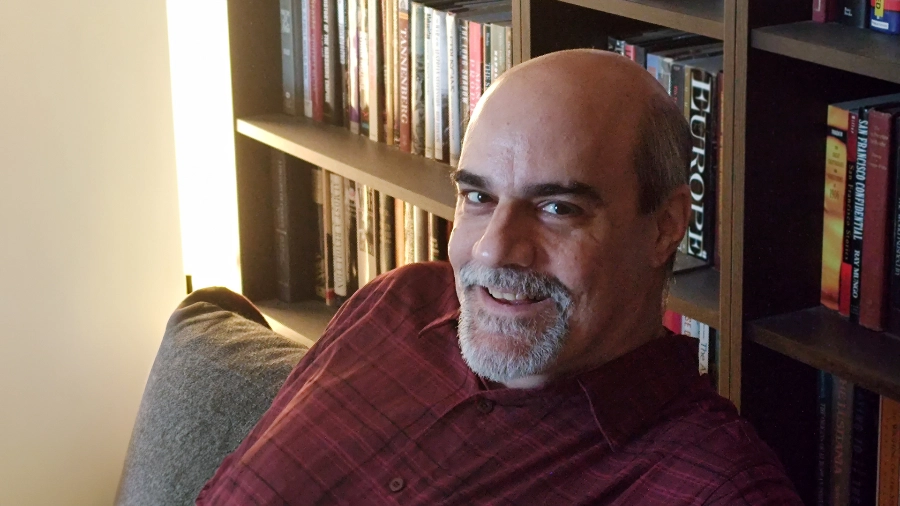 Michael Landolfi sitting in the living room