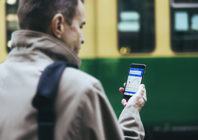 A man looks at his phone screen. - Jussi Hellsten / Helsinki Partners