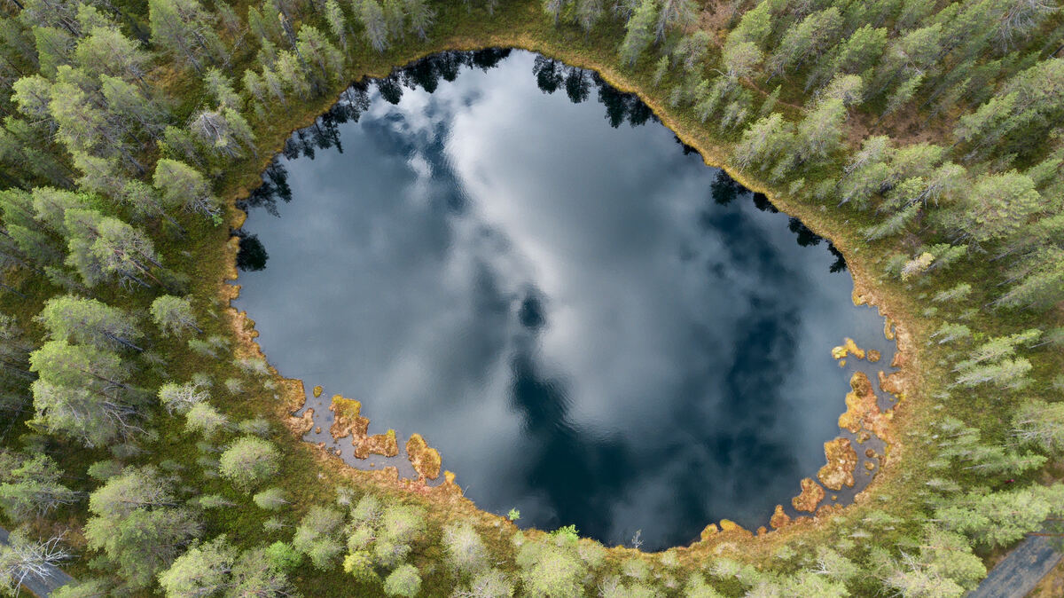 Aerial view of a tranquil pond in Posio. - Harri Tarvainen