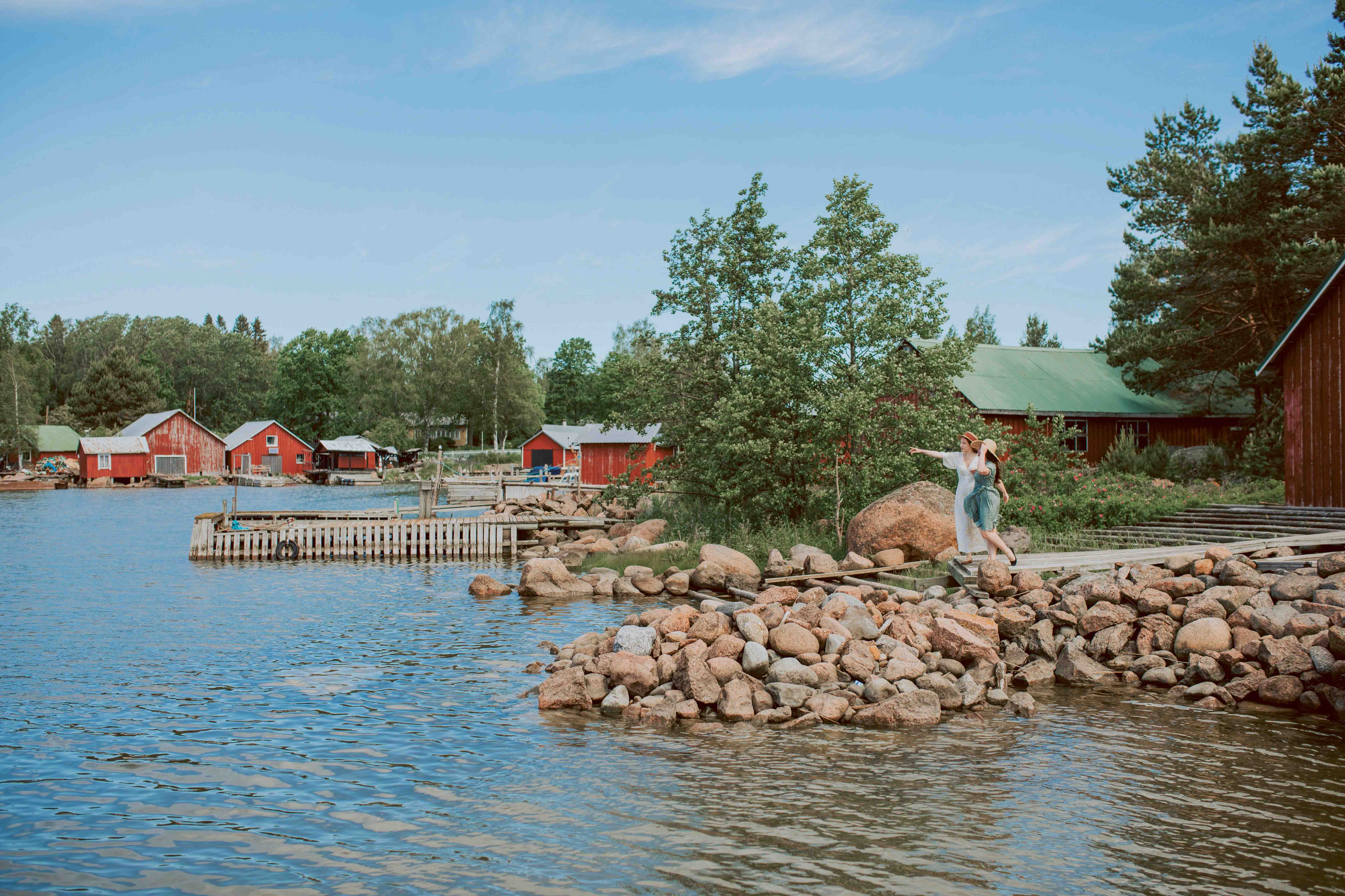 Red buildings in an idyllic coastal village