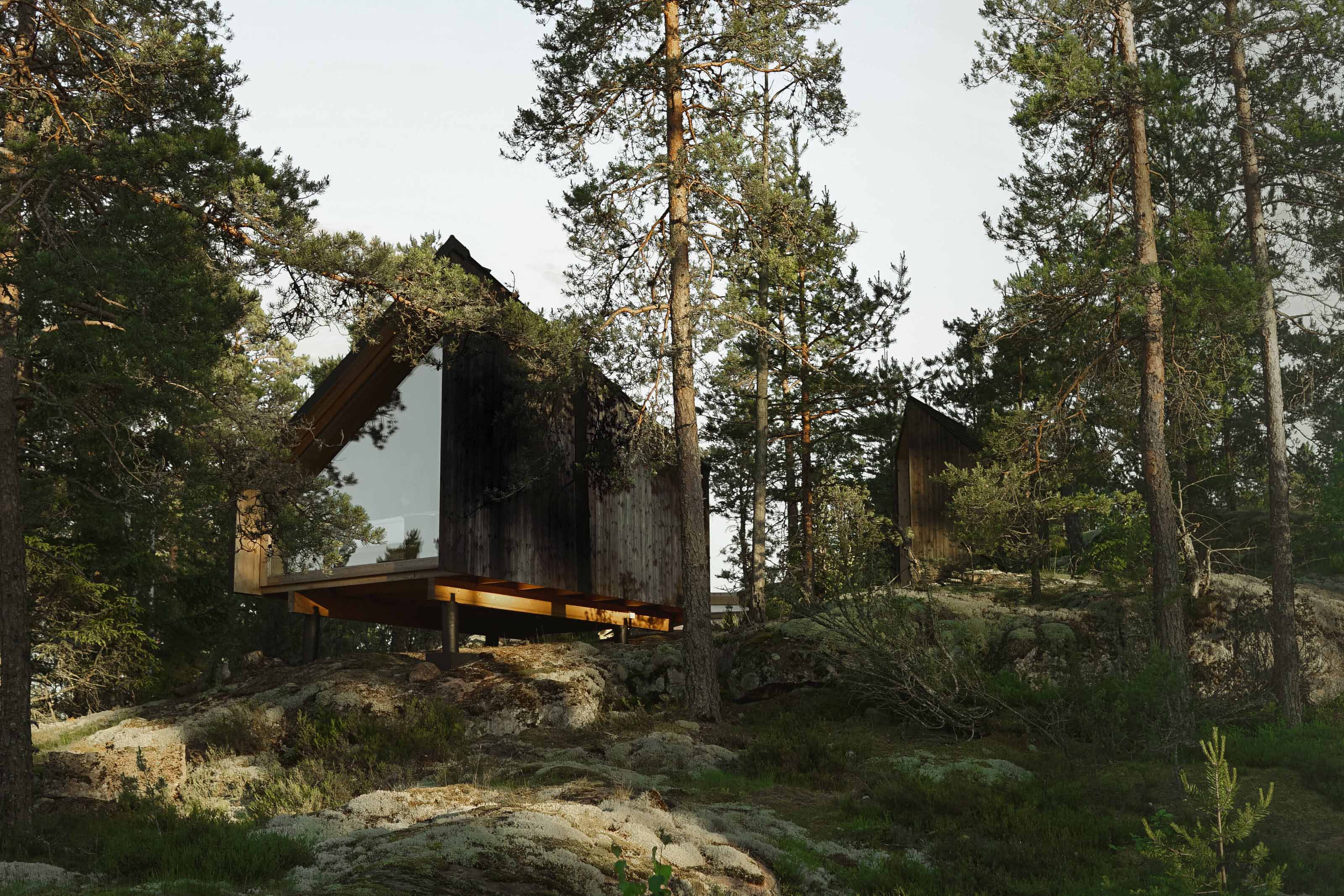 Hilltop forest cabins in the woods in Finland.